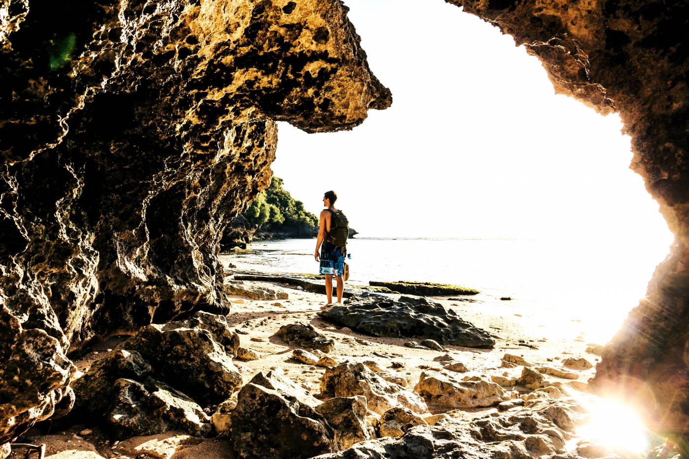 Man on Cave Beach - Serene Seaside Escape picture