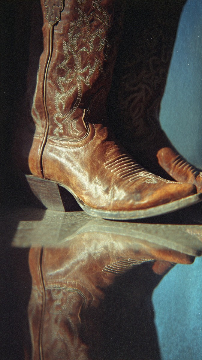 dallas faded cowboy boot sign reflection glass 958794f1 c640 4d7c