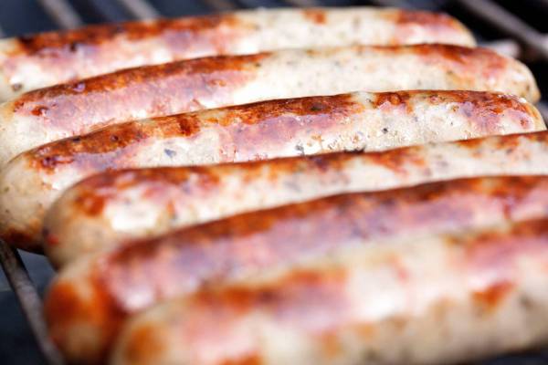 Sausages Grilling on Barbecue Royalty- and ...