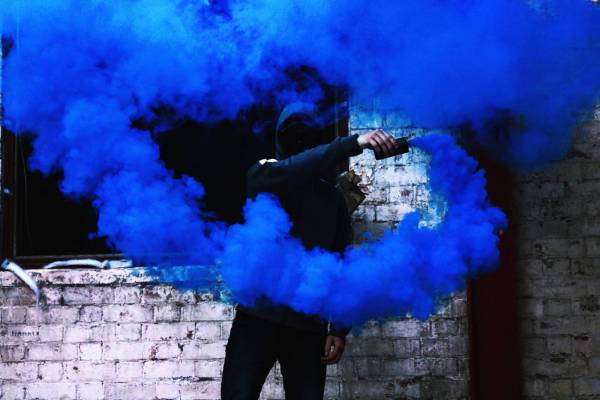 Man with Blue Flare 